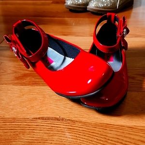 Big girls Rachel shoes size 4 with red bow accented ankle straps